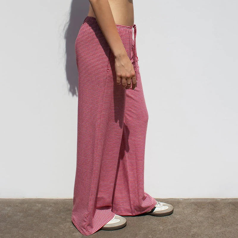 Women's striped print trousers with lace-up detail and wide-leg design in various colours