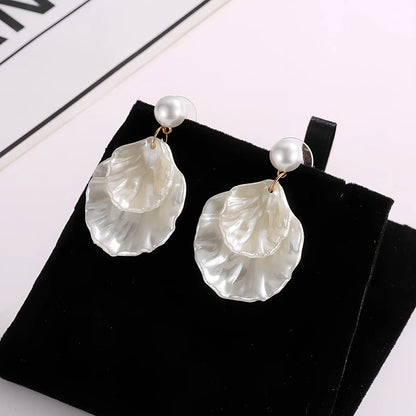 Women's acrylic pearl shell earrings with 5.2g lightweight design and shell shape