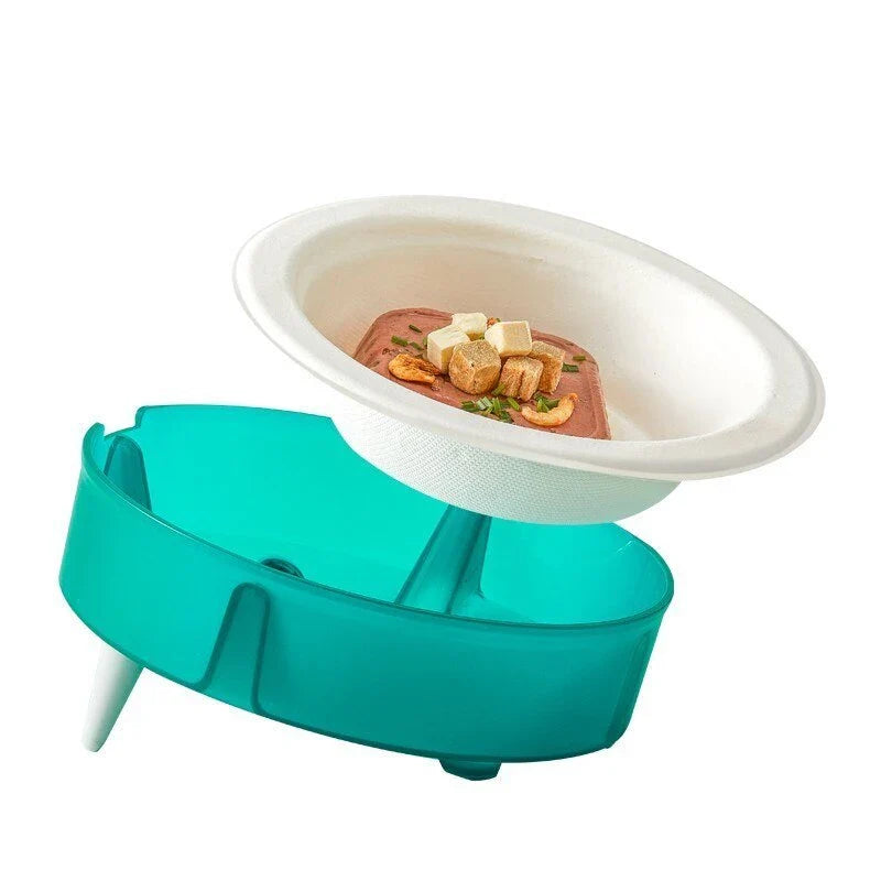 Eco-friendly disposable pet food bowl in malachite green and Tango Orange with non-slip base
