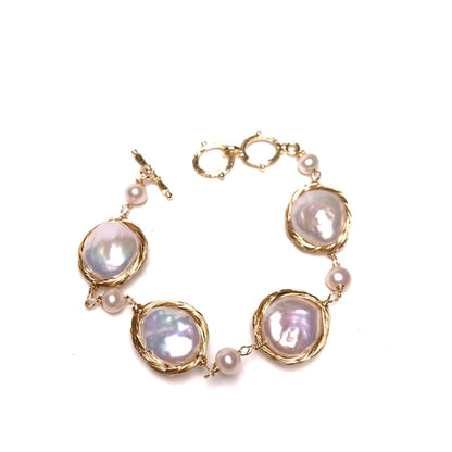 14K gold bracelet with 14mm white button freshwater pearls and baroque texture