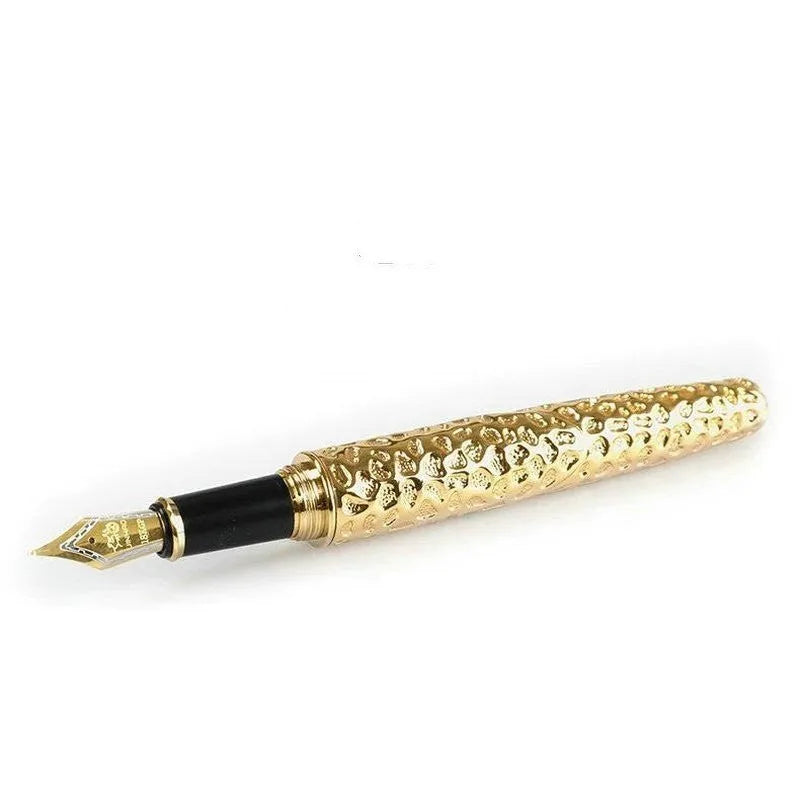 Metal embossed business gift pen in ancient silver or gold colour with professional office styling