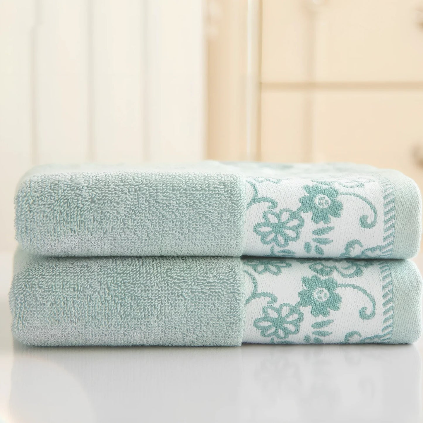 Creamy white wisteria flower jacquard cotton towel, 32 ply absorbent, 34x73cm dimensions