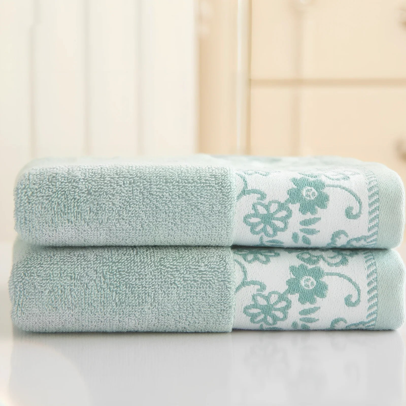 Creamy white wisteria flower jacquard cotton towel, 32 ply absorbent, 34x73cm dimensions