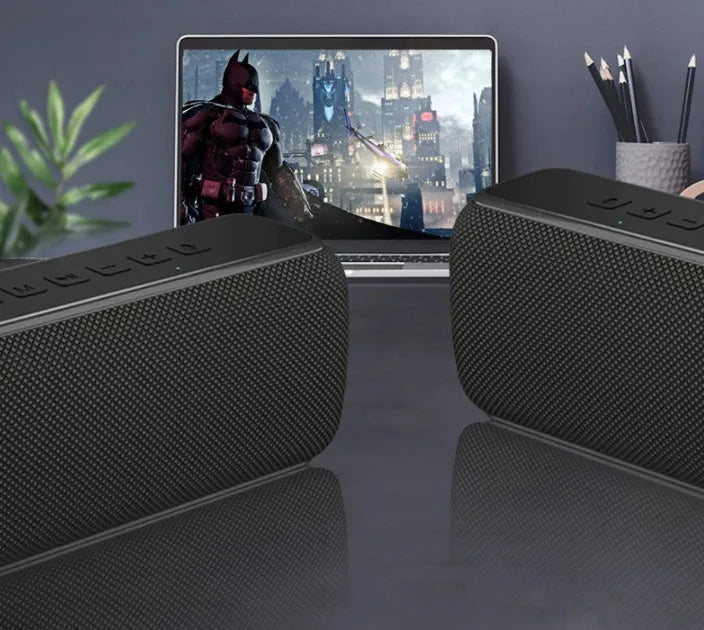 60W portable Bluetooth speaker with fabric finish and IPX5 waterproof rating