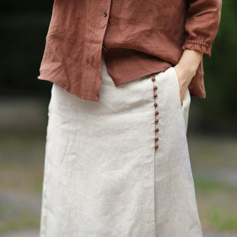 Mid-length raw jute color skirt with artistic irregular stitching in hemp