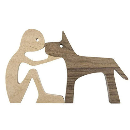 Handcrafted wooden dog sculpture featuring a man and his loyal canine companion