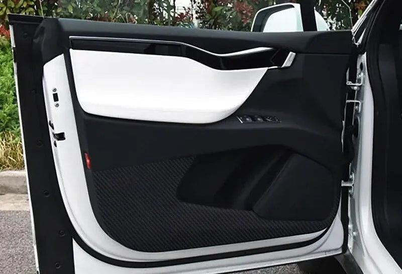 Carbon fibre pattern protective film for Tesla Model S door panels showing four pre-cut pieces