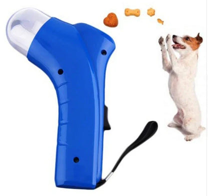Pet Food Catapult Feeder in assorted colours, showing spring-loaded treat launcher and wrist strap