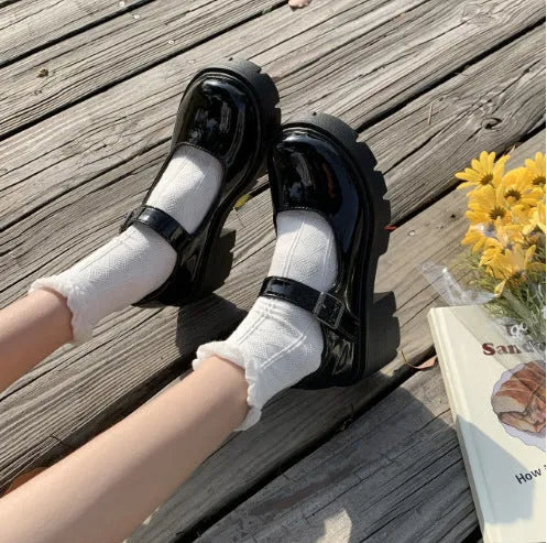 Women's British style buckle patent leather low heel shoes in beige with round toe and rubber sole