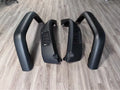 Four black plastic car wheel brow set for automobile wheel arch protection, total weight 2100g