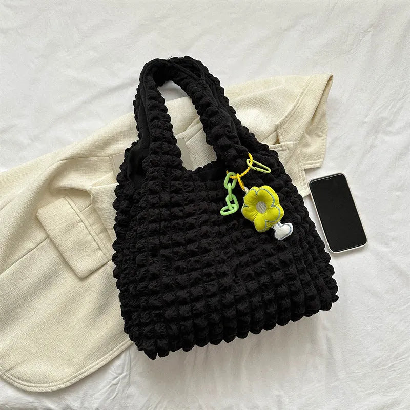 Women's pleated bubble handbag in five colour options with three-dimensional pockets