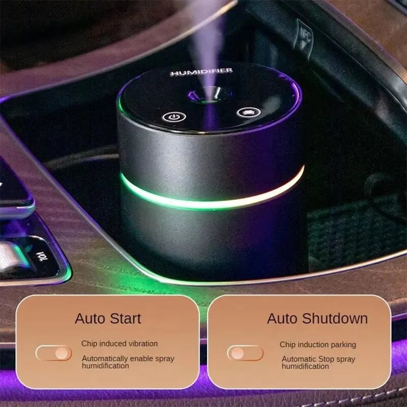 Aluminium portable car air humidifier and essential oil diffuser with coloured night light on.