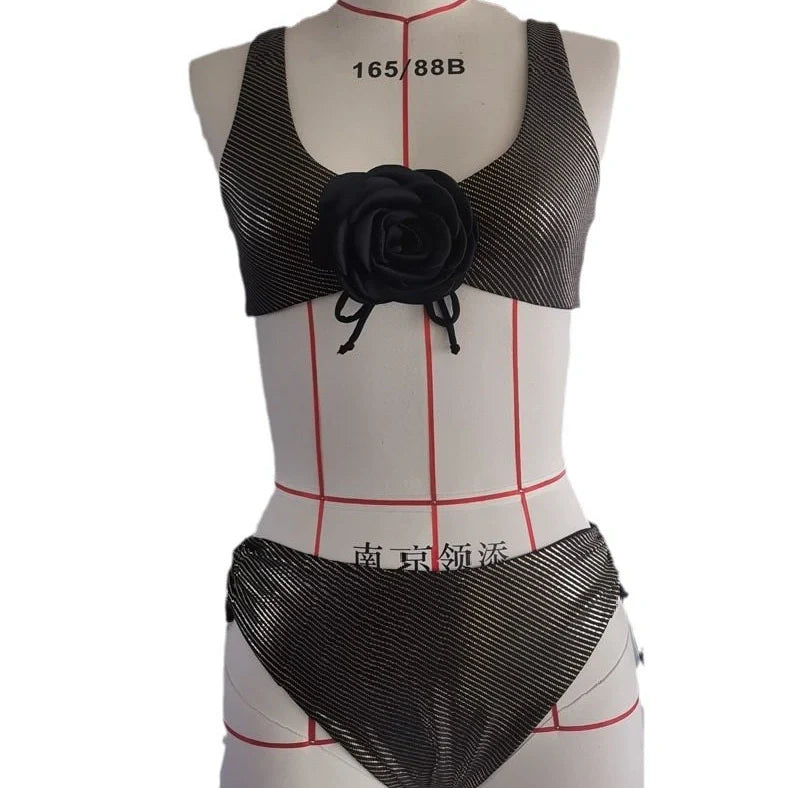 Black women's triangle swimsuit with adjustable ties and lined construction for swimming