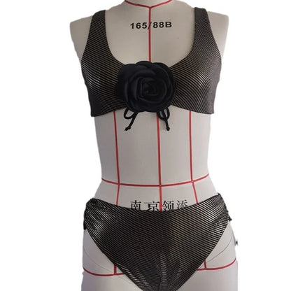 Black women's triangle swimsuit with adjustable ties and lined construction for swimming