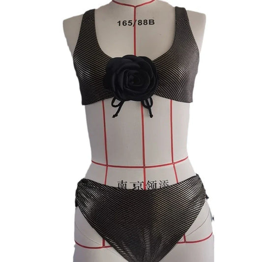 Black women's triangle swimsuit with adjustable ties and lined construction for swimming