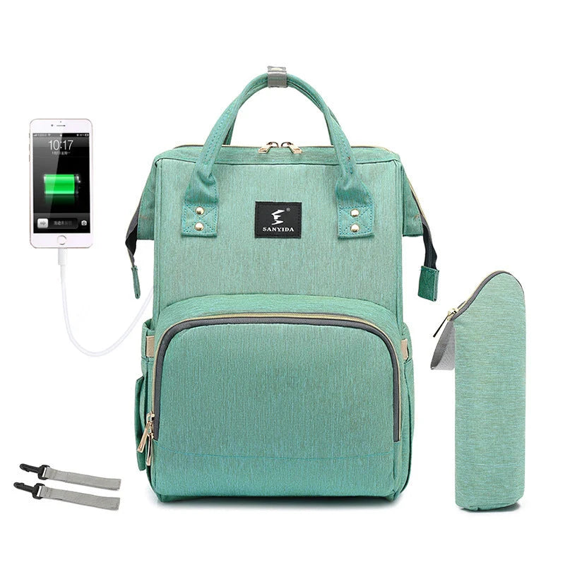 Portable Folding Crib Mummy Bag in green, grey, black, and pink options