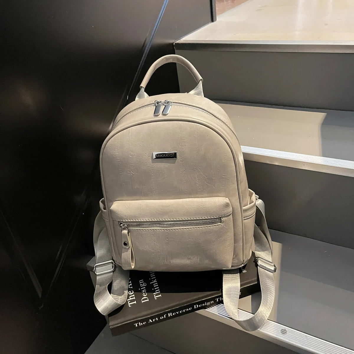 Ladies travel backpack in urban simplicity style, soft PU material, waterproof, with sandwich pocket
