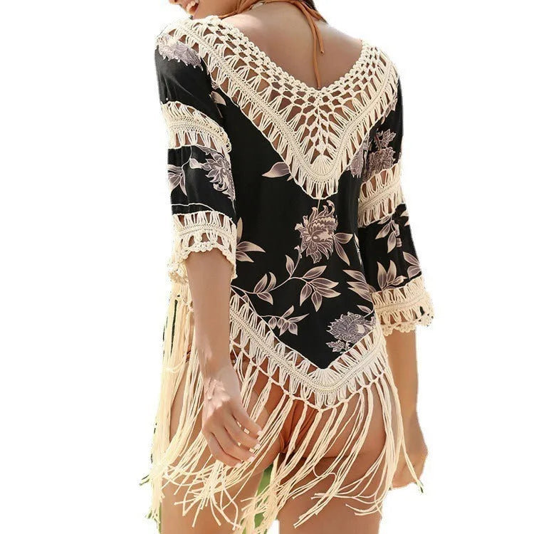 Women's apricot V-neck sun protection blouse with long hollow-out sleeves on a mannequin.
