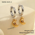 A pair of stainless steel earrings with 18K gold plating in a Christmas tree and heart shape design.