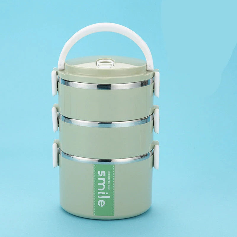 Stainless steel lunch box with built-in spoon, leak-proof design, in green, pink, and blue