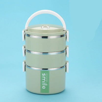 Stainless steel lunch box with built-in spoon, leak-proof design, in green, pink, and blue