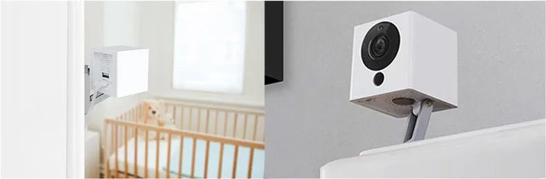 Small white 1080P Wi-Fi indoor security camera with wide-angle lens and night vision