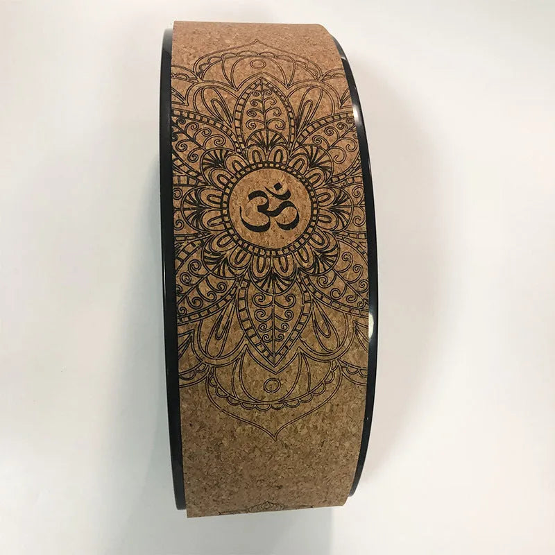 Half-round cork yoga wheel in black and wood grain for backbend and abdominal exercises