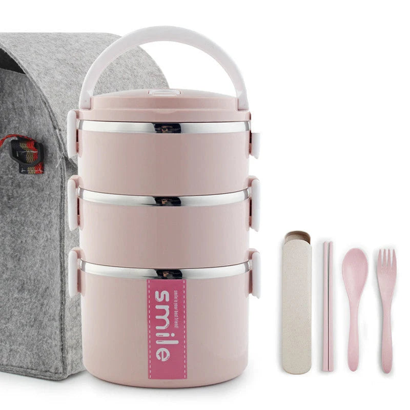 Stainless steel lunch box with built-in spoon, leak-proof design, in green, pink, and blue
