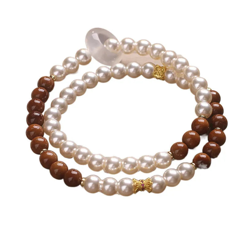 Natural white freshwater pearl and crystal double circle cook stitching flexible bracelet on woman's wrist, 34cm circumference
