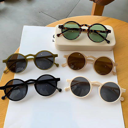 Small round frame UV protection sunglasses in black with PC lenses and Class 2 shading for outdoor wear