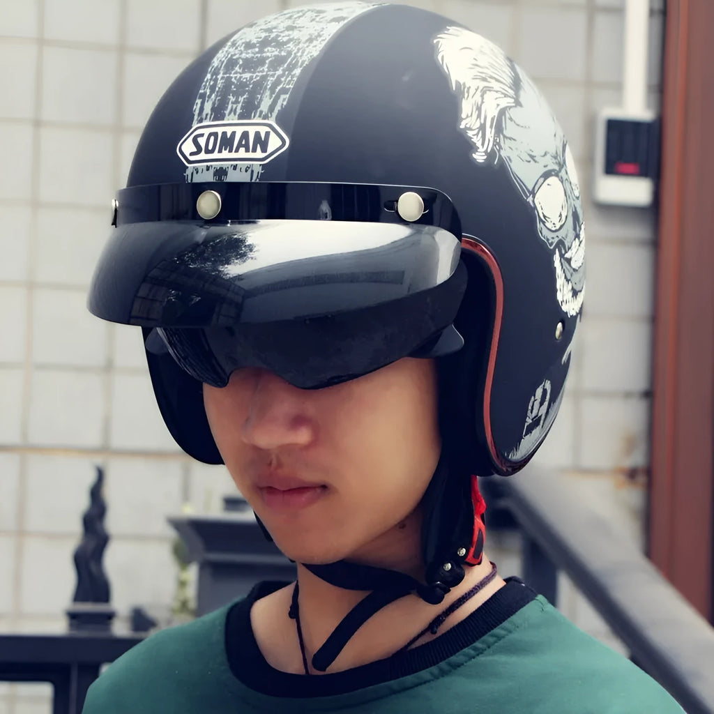 Retro style half helmet for motorcycle or electric scooter riding, shown in a vintage graphic colour option.