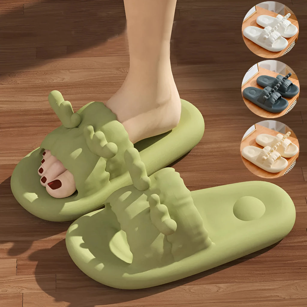 Women's flip-flop style slippers with deer horn design, shown in light yellow on a non-slip EVA sole.