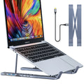 Aluminium alloy folding laptop docking station and stand in silver, shown with multiple USB and HDMI ports.