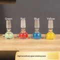 Coloured glass trumpet pipe smoking accessory measuring 7cm in geometric shape