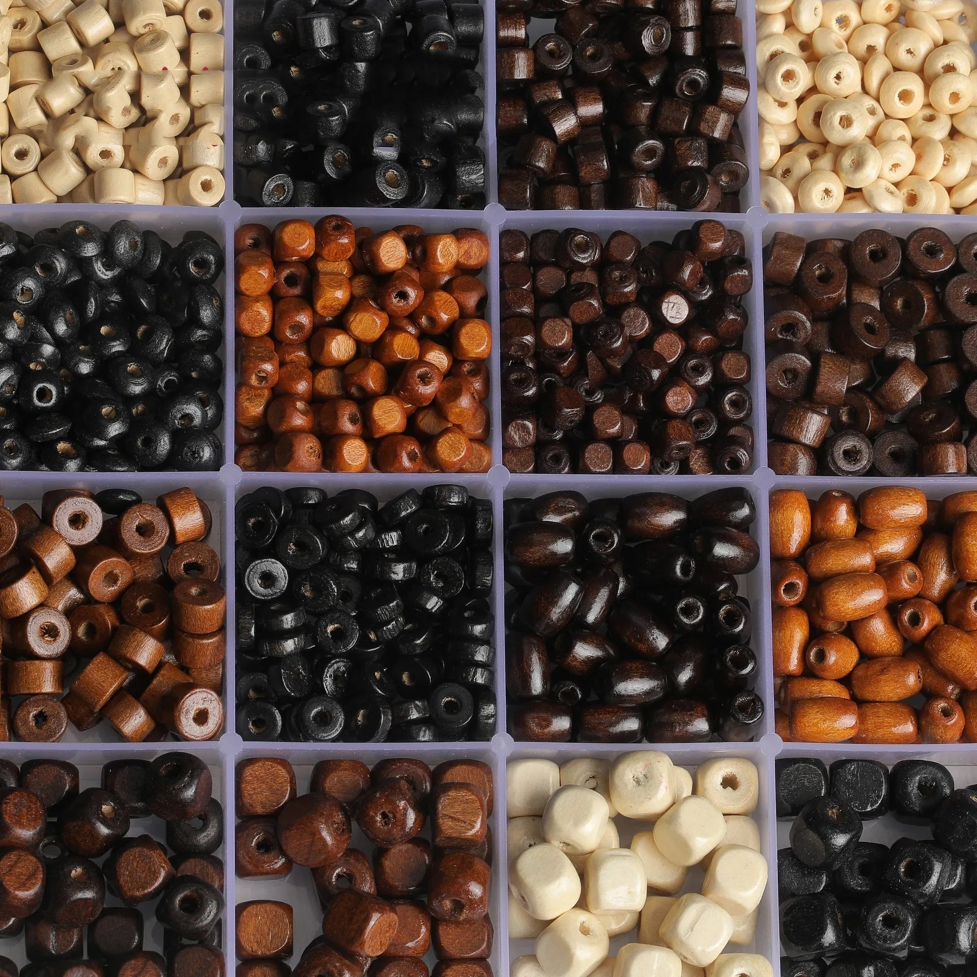 Scattered vintage solid wood beads in mixed colours for DIY jewellery making.