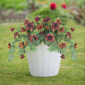 Plastic decorative flower container with 12 fork stems holding colourful artificial flowers