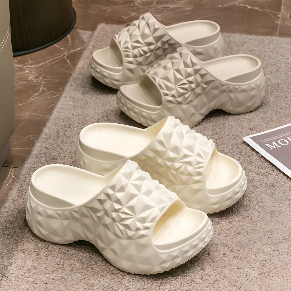 EVA foam flip flop slippers with a thick sole in black, khaki, or white colour.