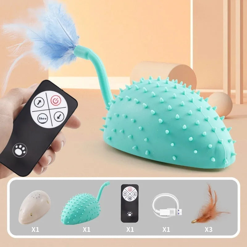 Remote control and USB-rechargeable silicone mouse cat toy in cyan colour with attached feathers.