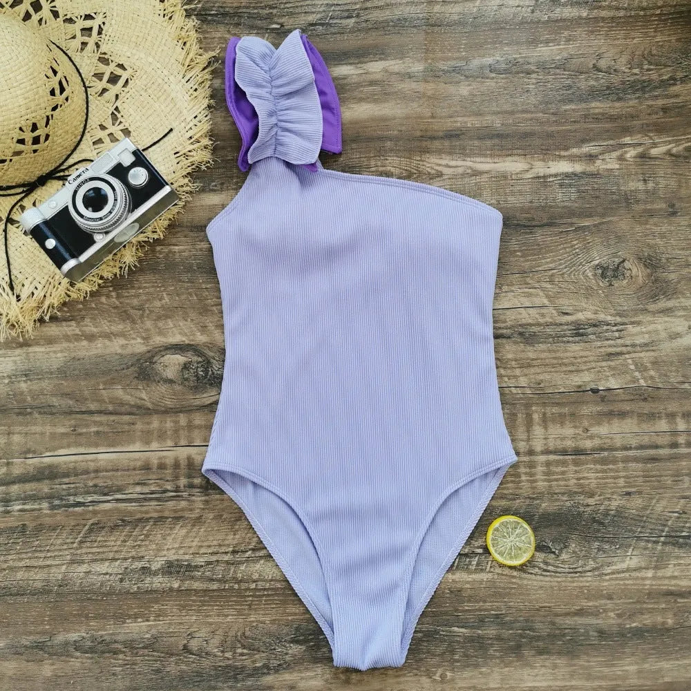 Women's single-shoulder suspender tube top one-piece swimsuit in a high-waist cut, shown in a solid colour.