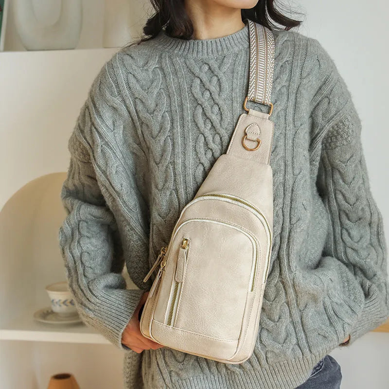 Soft brown PU leather women's crossbody messenger bag with an open front pocket and strap.