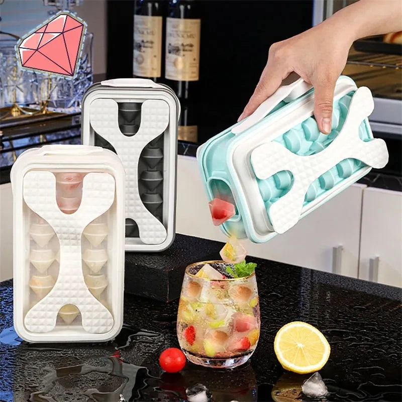 Silicone ice ball mould bottle in light grey, showing integrated ice tray and bottle with lid.
