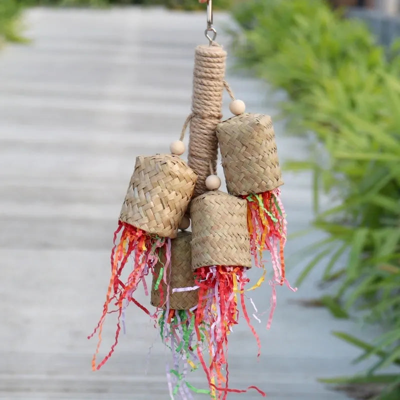 Colourful shredded paper parrot biting toy with wood beads and sisal rope, measuring 15 by 35 cm