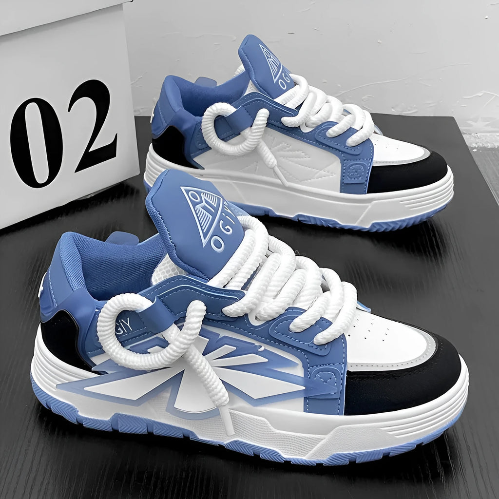Men's white chunky sneakers with a cartoon totem pattern, thick rubber sole, and lace-up closure.