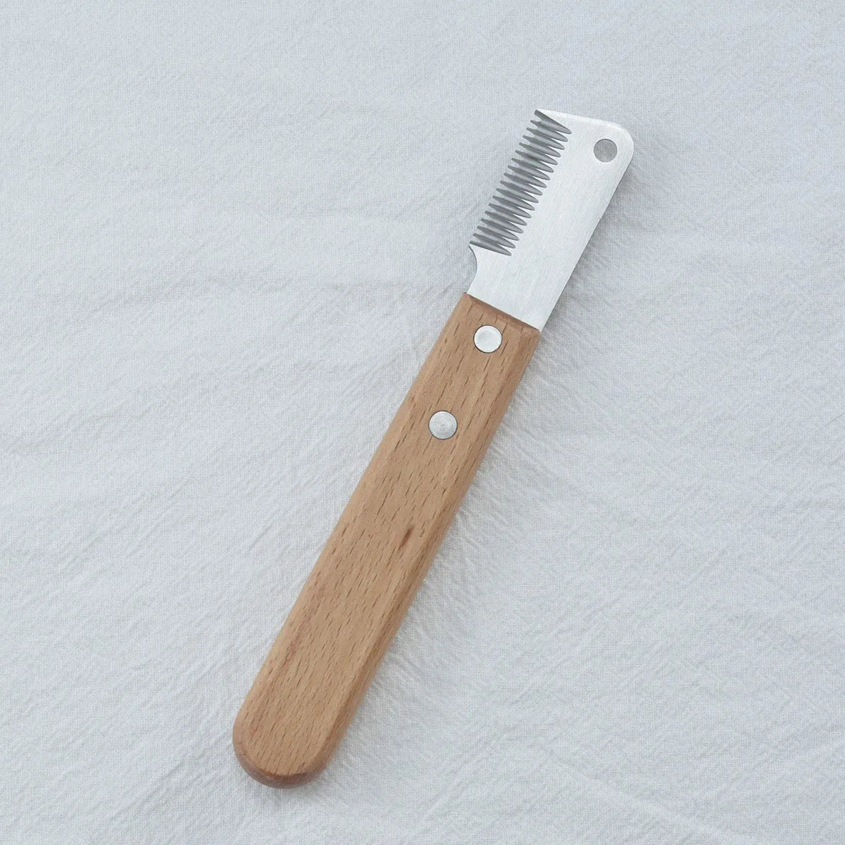Pet stripping comb grooming tool with wood handle and metal teeth, shown in long and short size options.