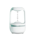 Anti gravity humidifier water drop backflow with 500ml white ABS body and black base on a desk