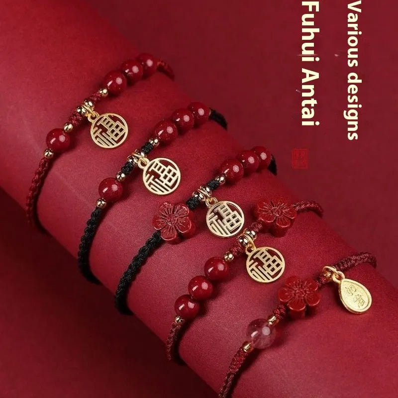 Cinnabar Ashore braided rope good luck bracelet with a blessing card charm.