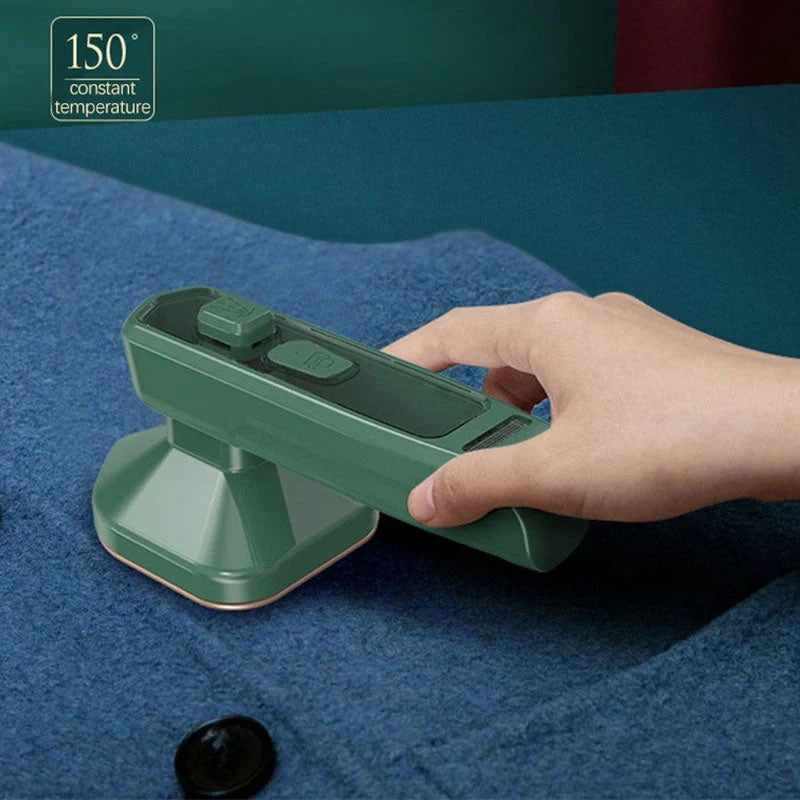 Green handheld garment steamer for quick ironing and sterilisation