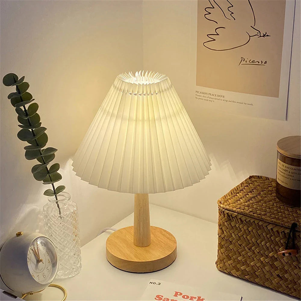 Versatile bedside lamp with dimmable LED light, bamboo base, and pleated fabric shade for New Zealand homes