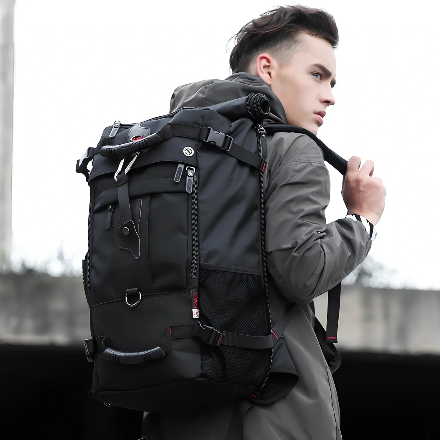 Multifunctional travel bag with multiple compartments in black, green, or blue colours showing 40L and 50L size options