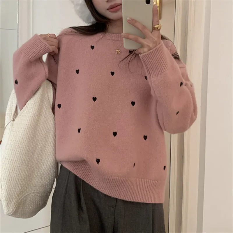 Beige loose-fit women's acrylic pullover sweater with long sleeves and chest embroidery.